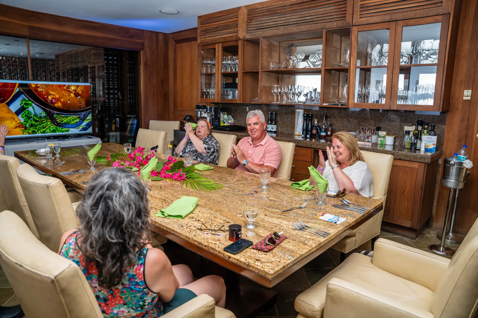 Guests enjoy small plates together in Carambola Beach Club’s wood-panelled dining room.